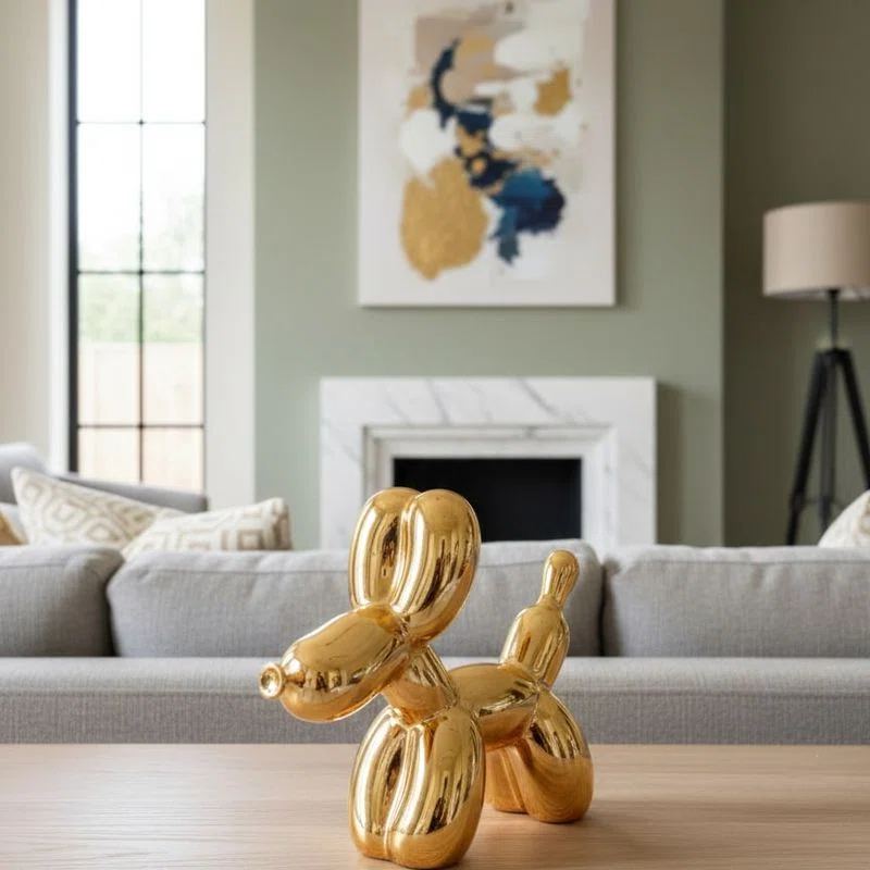 Figura decorativa perro dorado pequeño